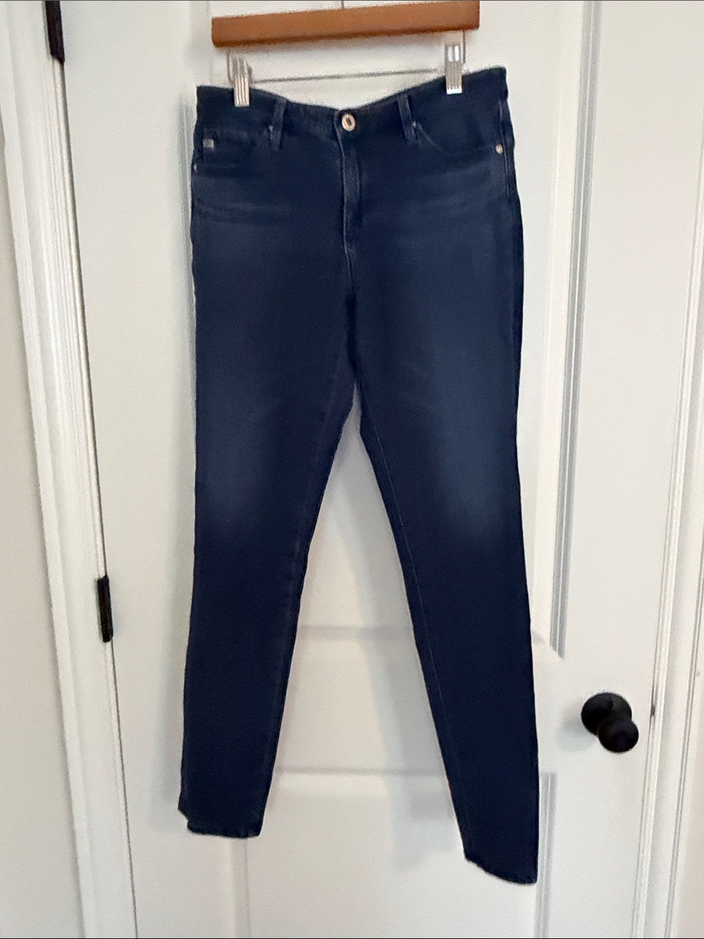 The prima AG mid rise cigarette contour 360 fit 28R in a dark blue wash